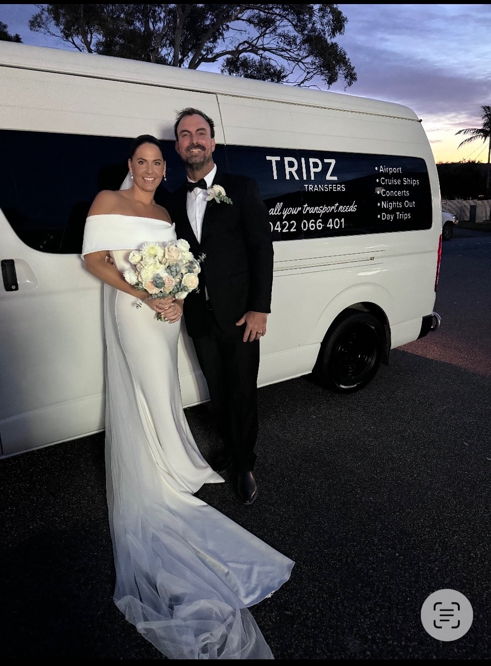 Bride and groom beside the TRIPZ van on their wedding day