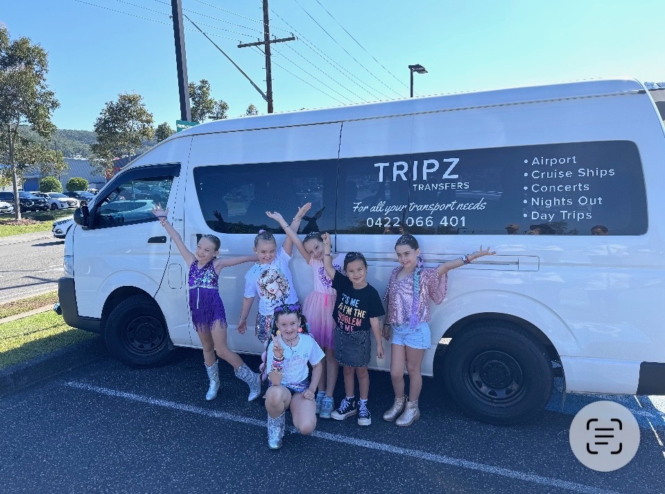 Birthday party children waving beside the TRIPZ van