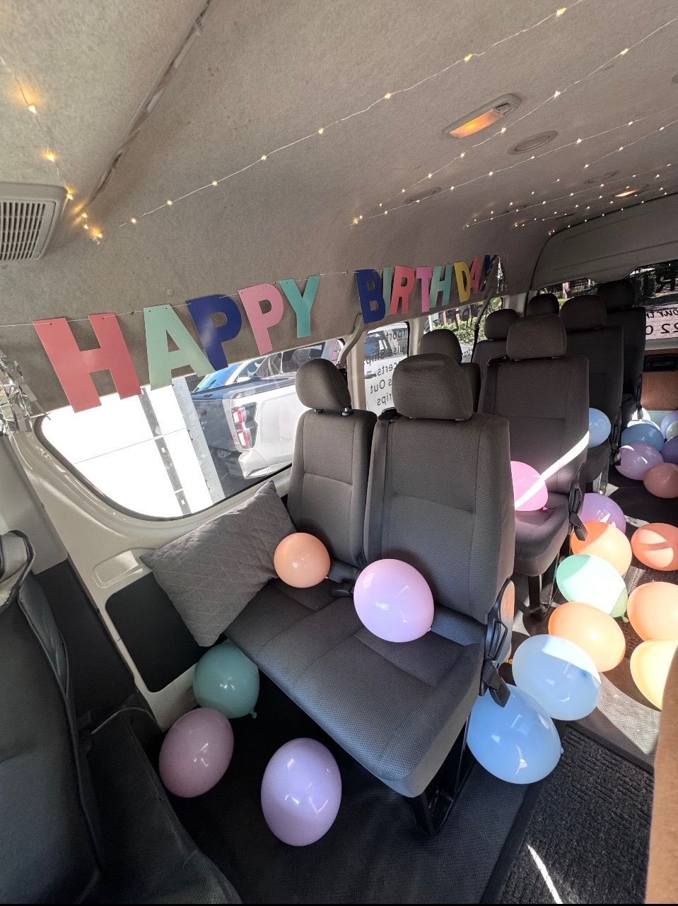 TRIPZ van decorated with birthday bunting and balloons