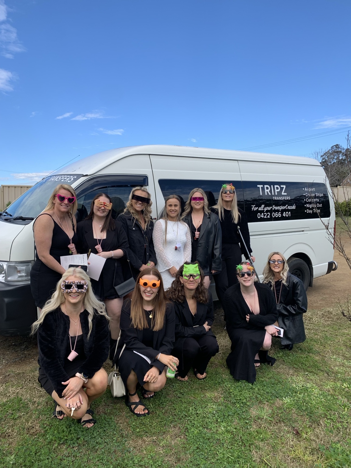 Hen party group gathered beside the TRIPZ van